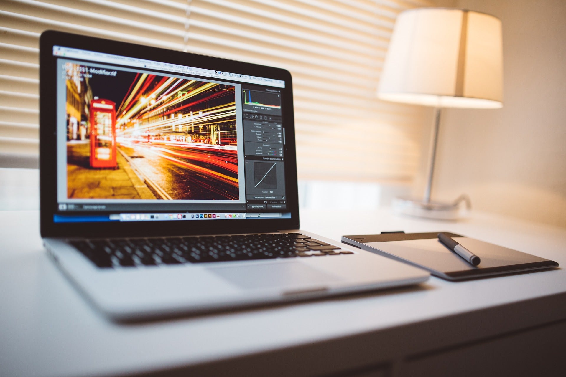 A laptop in the foreground, ready for working.